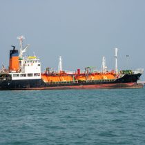 Oil Ship LPG tanker, floating Storage Unit import export petroleum gas LPG and CNG logistics transportation concept